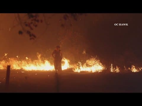 Woman walking barefoot rescued during California wildfires