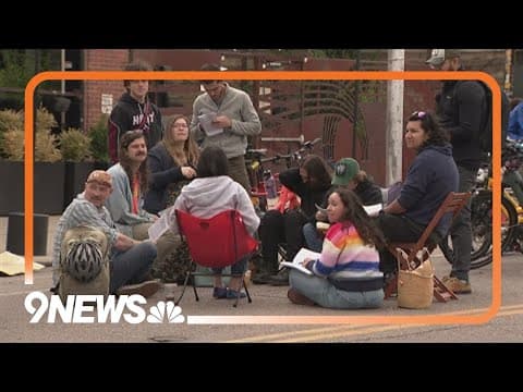 Group protests reopening of Larimer Street to cars