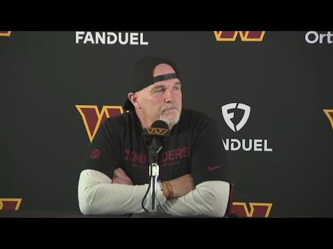 Washington Commanders coach Dan Quinn speaks ahead of practice with New England Patriots