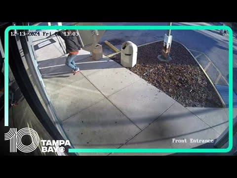 RAW VIDEO: Man tries to break into gun store using road work sign