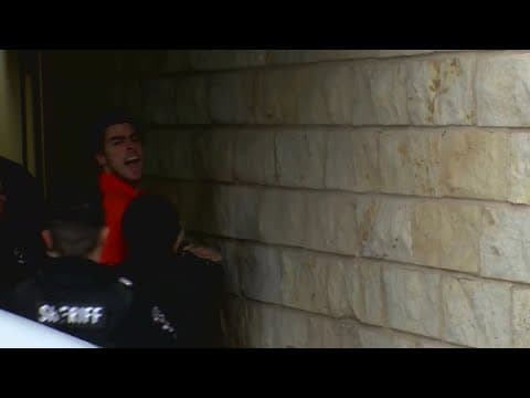 Luigi Mangione screams "It's an insult to the intelligence of Americans!" while being led into court