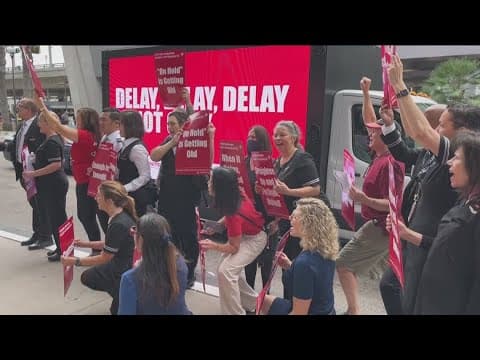 United flight attendants rally outside San Diego International Airport during busy Labor Day travel