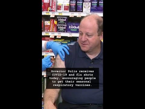 Colorado Governor receives
COVID-19 and flu shots