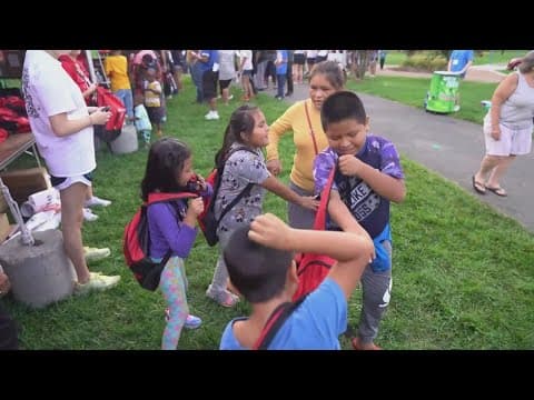 Interpreters bridge gaps at Knoxville's Shoes for School event