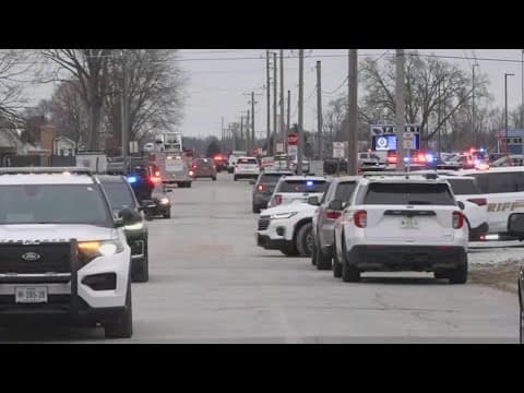 Iowa community mourns victims in Perry High School shooting