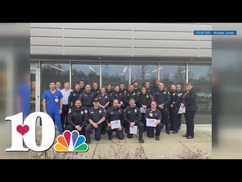 Police officers and first responders graduate from training for crisis intervention team