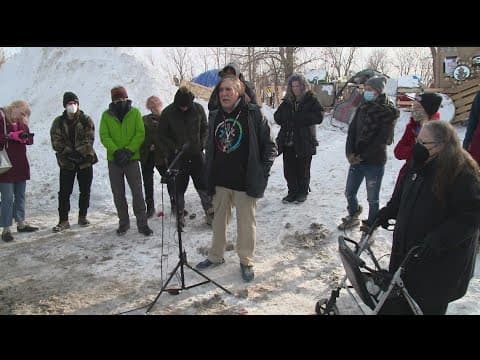 As city threatens to shutter encampment, residents ask for more time