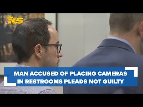 Man accused of installing hidden cameras in restrooms at Expedia offices pleads not guilty