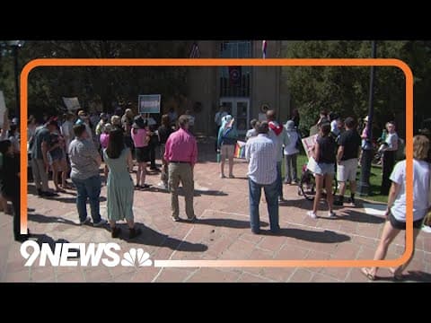 Members of LGBTQ community rally for trans rights after SCOTUS decision