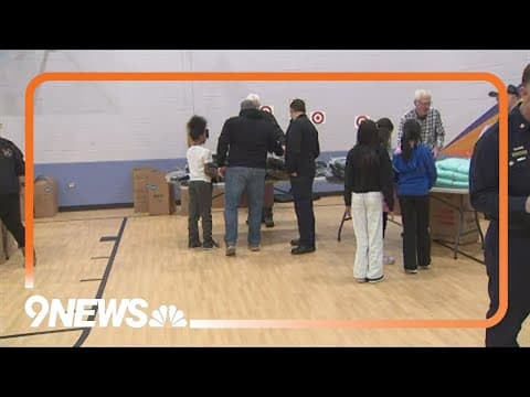 Firefighters gifting winter coats to kids in Denver