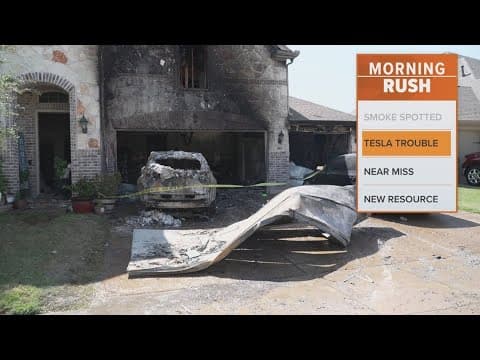 Firefighters pull charred Tesla out of Lewisville home