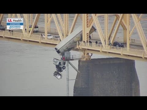 Driver rescued after semi-truck goes off Clark Memorial Bridge in Louisville