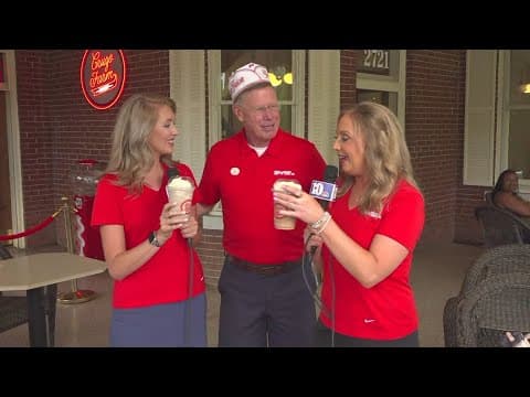 Todd Howell serves up some ice cream to Katie Inman and Brittany Bailey
