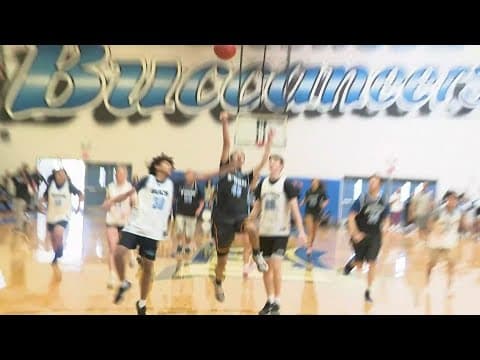 It's a basetball game in at Brazoswood High School that everyone gets involved in