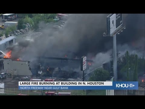 Aerials: Large car lot on fire in north Houston
