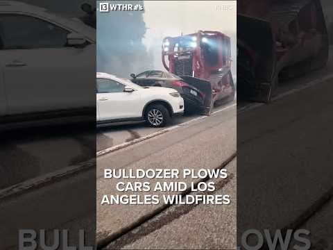 Bulldozer plows cars amid Los Angeles wildfires