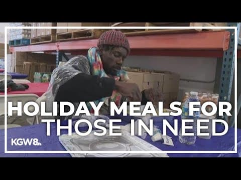 Volunteers serve hot meals to those in need on Christmas