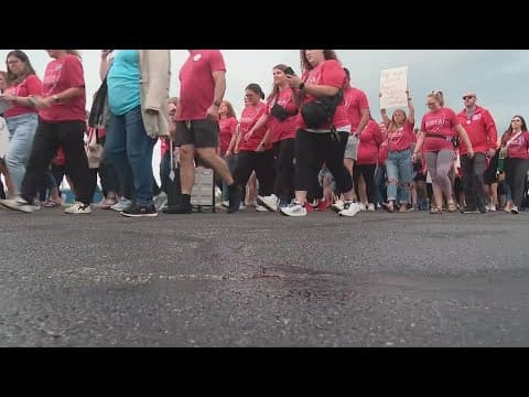 Hundreds gather to protest at South-Western City Schools board meeting