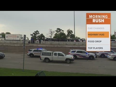 Woman who sat in the middle of the highway with a gun will not face charges