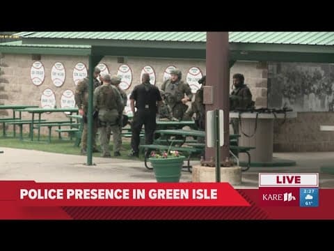 Law enforcement gathering at shooting suspect's home in MN