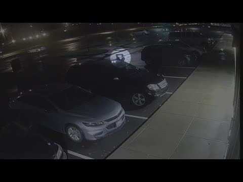 Video shows man banging on SUV window with gun before shootout with officers