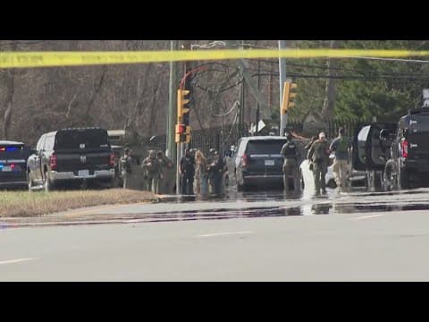 Armed man surrenders after hours-long standoff near CIA headquarters
