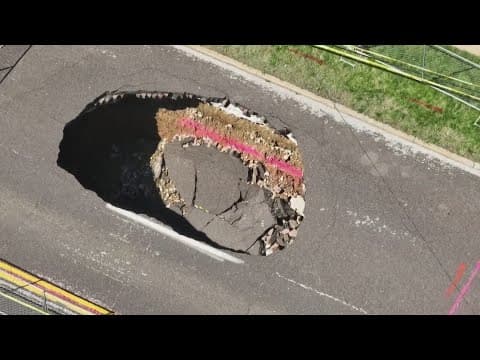 20-foot-deep sinkhole shuts down St. Louis street