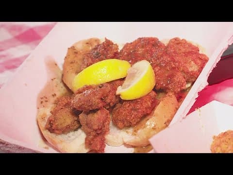 Weekend 2 at Jazz Fest in New Orleans: Fried oysters po'boy, Cajun-style street corn