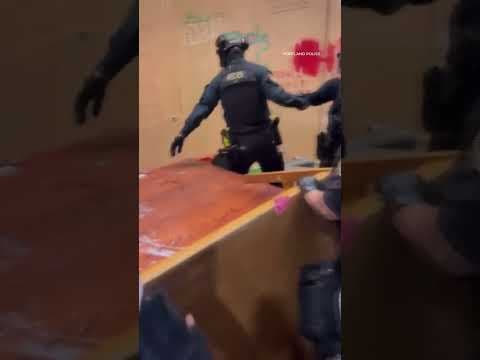 Portland police clear Portland State University protest barricades at library