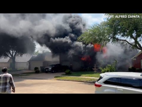 Witness shares video of massive NW Harris County house fire in which woman is still missing