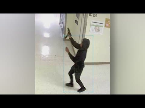 Surveillance video shows the moment shots were fired inside Wilmer-Hutchins High School