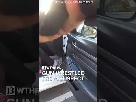 Video shows tense moments as New York officers wrestle gun away from man
