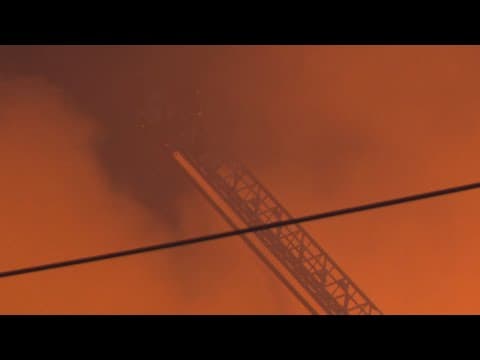 Dallas, Texas fire contained but still burning Tuesday morning