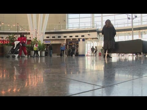 Indianapolis airport plays host to family reunions on Christmas Eve