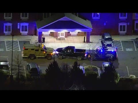 Person in custody after barricading himself in truck