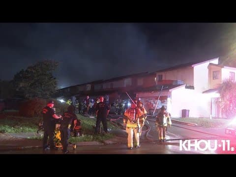 Houston firefighters honored after saving woman who collapsed in large duplex fire