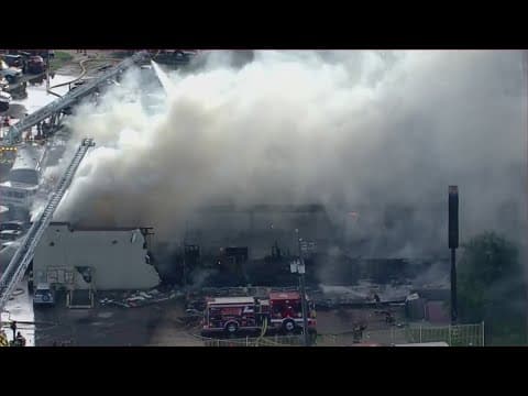 Massive fire burns at commercial building in north Houston