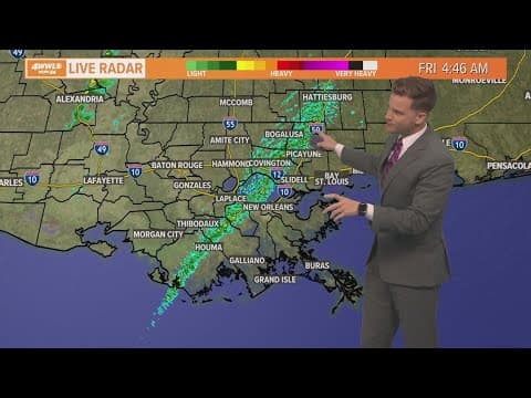 Cool front arrives this morning with a few showers