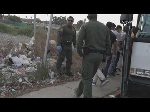 Hundreds of migrants dropped off at the trolley station in San Ysidro