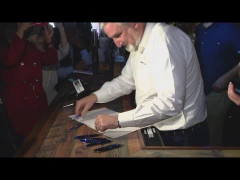 Governor Holcomb signs law bringing back 'happy hour' to Indiana