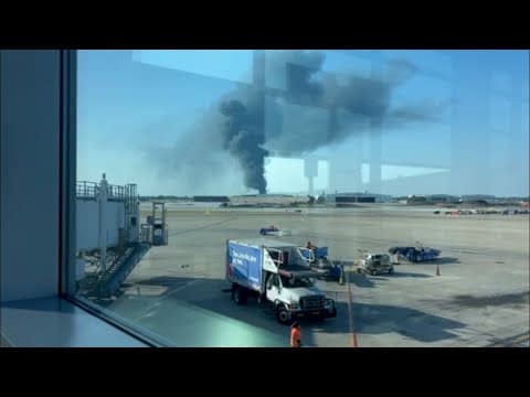 Massive plume of smoke erupts from fire near Love Field