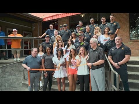 Dallas firefighter injured in West End fire honored at Hooters reopening