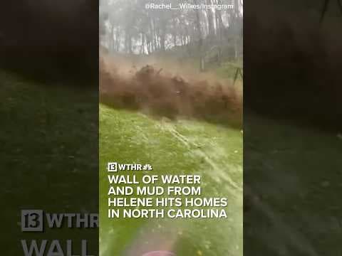 Wall of water and mud from Hurricane Helene slams into homes in North Carolina