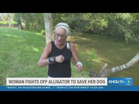 Woman fights off alligator to save her dog