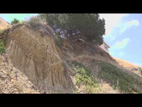 Bluff collapse in Old Town San Diego prompts evacuations, damages vehicle