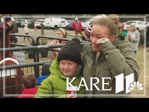 Group gifts Christmas trees to those in need