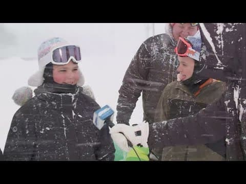 Family enjoys New Orleans snow on the levee