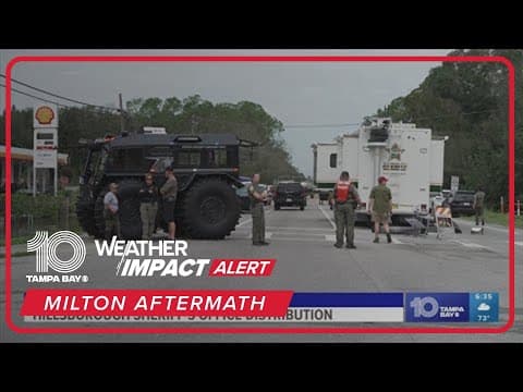 Hillsborough Sheriff's deputies helping to hang out supplies after Milton