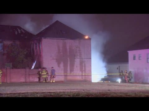 Firefighters respond to a fire in a large Fort Worth home