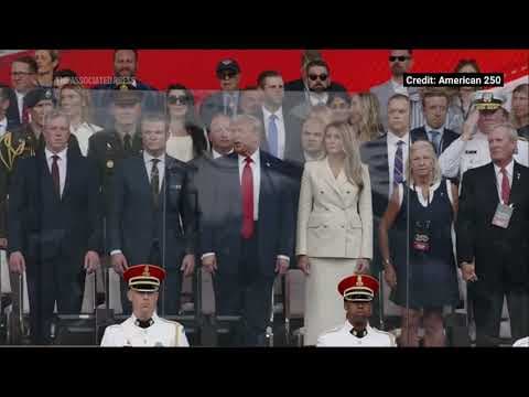President Donald Trump arrives on stage for military parade